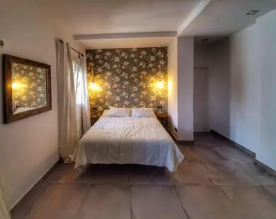 Cama o camas de una habitación en El Patio de San Bernardo