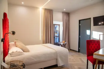 Cama o camas de una habitación en Palacio San Fernando