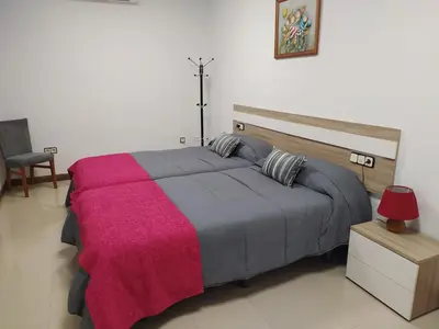 Cama o camas de una habitación en El LEGADO