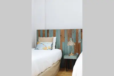 Cama o camas de una habitación en Hostly Sol 2bdr flat with patio in Seville center