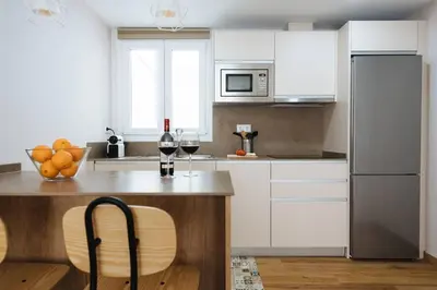 Una cocina o zona de cocina en Hostly Sol 2bdr flat with patio in Seville center
