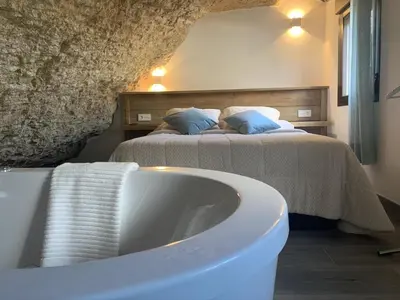 Cama o camas de una habitación en Apartamentos3Cuevas