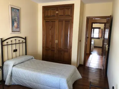 Cama o camas de una habitación en La casa de Tita Elvira 6