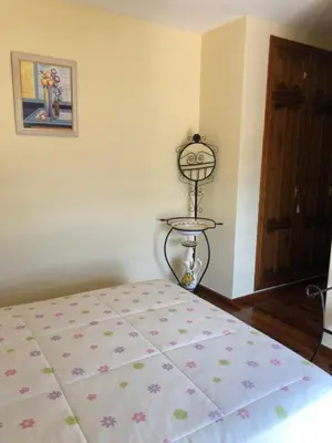 Cama o camas de una habitación en La casa de Tita Elvira 6