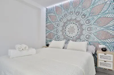 Cama o camas de una habitación en SunShine Vista al Compás