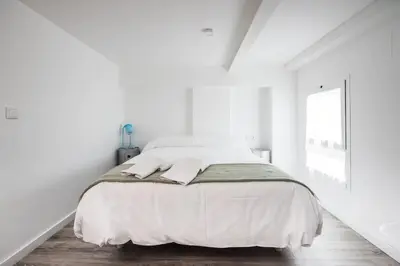 Cama o camas de una habitación en Pop Art Feria luminoso dúplex con terraza privada