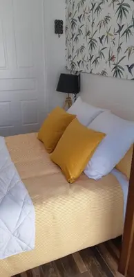 Cama o camas de una habitación en Apartamentos A Poniente