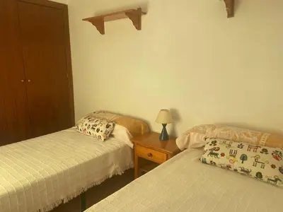 Cama o camas de una habitación en APARTAMENTO RURAL CASA MONTE