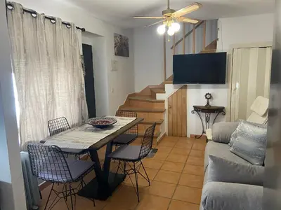 Una televisión o centro de entretenimiento en APARTAMENTO RURAL CASA MONTE