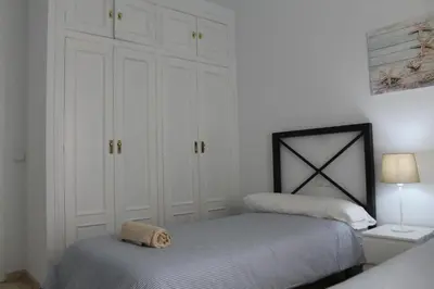 Cama o camas de una habitación en PISO EN PLENO CORAZÓN DE CORDOBA