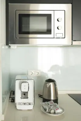 Una cocina o zona de cocina en Arco Macarena Suite by SHS