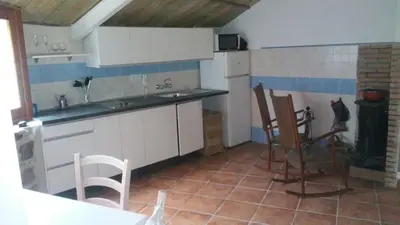 Una cocina o zona de cocina en Casita para dos con piscina privada