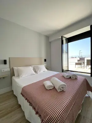 Cama o camas de una habitación en Aticos Concepción Centro
