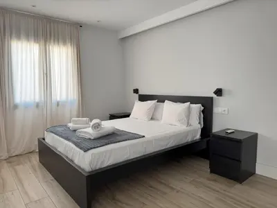 Cama o camas de una habitación en Aticos Concepción Centro