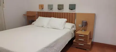 Cama o camas de una habitación en Apartamento Torres19