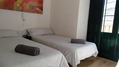 Cama o camas de una habitación en Apartamento Centro Santa Catalina 1ºA