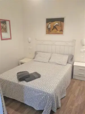 Cama o camas de una habitación en Apartamento Centro Santa Catalina 1º B