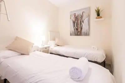 Cama o camas de una habitación en Divina Central Style by Valcambre