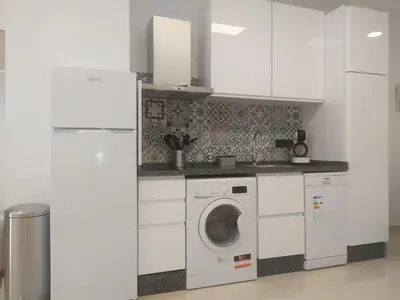 Una cocina o zona de cocina en Apartamentos Cordoba