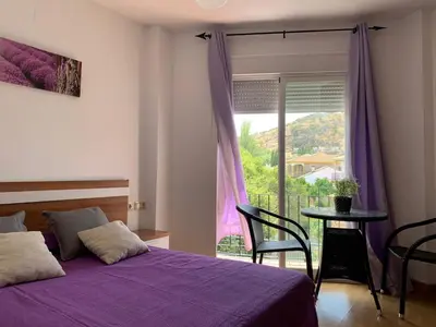 Cama o camas de una habitación en Apartamento en Cuevas del Becerro