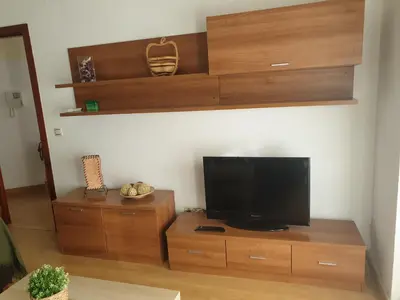 Una televisión o centro de entretenimiento en Apartamento en Cuevas del Becerro