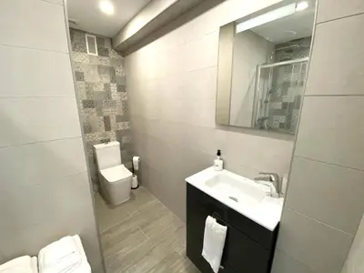 Un baño de Residencial Santa Justa - Vacacional Sevilla
