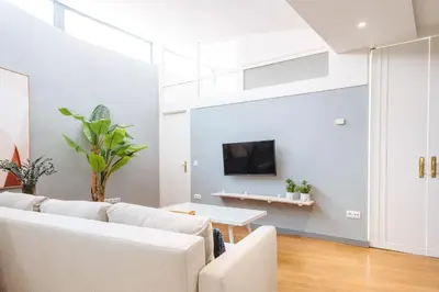 Una televisión o centro de entretenimiento en Conde de Ibarra Suite Apartment