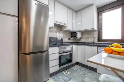 Una cocina o zona de cocina en Fleming, cómodo apartamento junto Mezquita y Judería