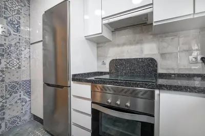 Una cocina o zona de cocina en Fleming, cómodo apartamento junto Mezquita y Judería