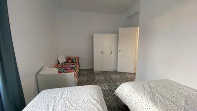 Cama o camas de una habitación en Casa Las Gardenias