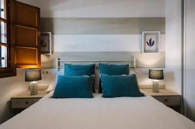 Cama o camas de una habitación en Encarnación Suite Apartment