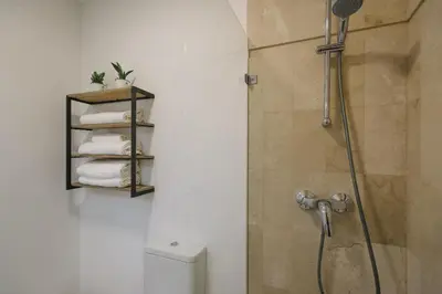 Un baño de Encarnación Suite Apartment
