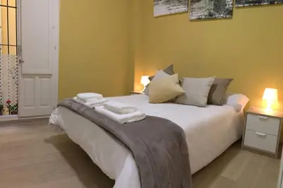 Cama o camas de una habitación en Cozy and well located apartment in the center of Seville