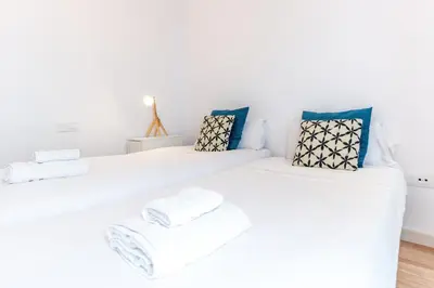 Cama o camas de una habitación en Alohamundi Alameda III