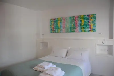 Cama o camas de una habitación en Purísima Vivienda Turística