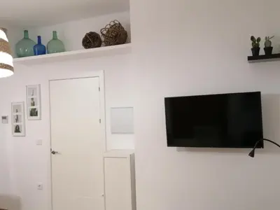 Una televisión o centro de entretenimiento en Purísima Vivienda Turística