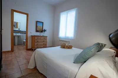 Cama o camas de una habitación en Casa los Jardines del Lago