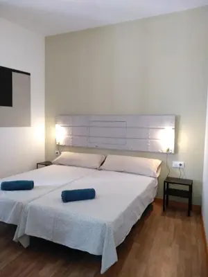 Cama o camas de una habitación en Apartamento Centro Encarnación 1º I