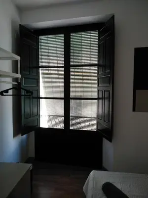 Cama o camas de una habitación en Apartamento Centro Encarnación 1º I
