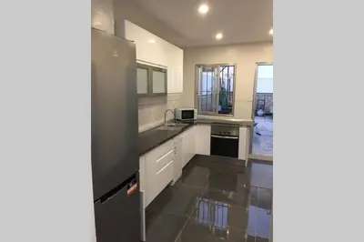 Una cocina o zona de cocina en CASA REFORMADA CON TERRAZA/WIFI/AIRE ACONDICIONADO