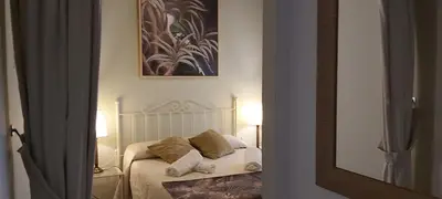 Cama o camas de una habitación en A 20 Metros De La MEZQUITA CATEDRAL ,APARTAMENTOS TURISTICO CESPEDES 5