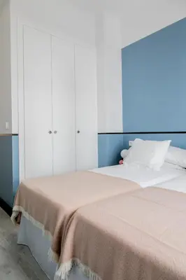 Cama o camas de una habitación en Pasaje Zamora Apartamentos