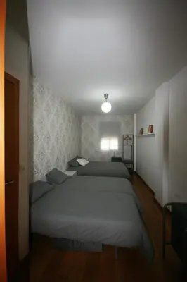 Cama o camas de una habitación en ESSE Apartamentos Las Setas