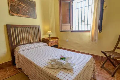Cama o camas de una habitación en La Posada de Rivero