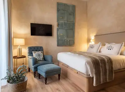 Cama o camas de una habitación en Casa Sevilla 1855 Suites by Época