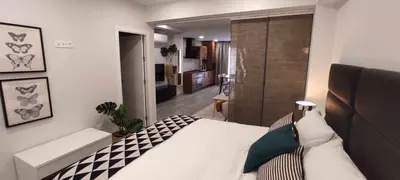 Cama o camas de una habitación en GRUPO LIMCOTEl PERLA 1