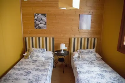 Cama o camas de una habitación en EL VENERO DE MOSTOLES
