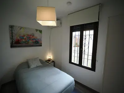 Cama o camas de una habitación en Calle San Basilio - Patios. Aparcamiento gratis
