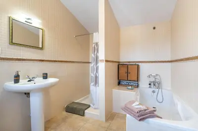 Un baño de Hacienda la buena vida B&B en appartementen