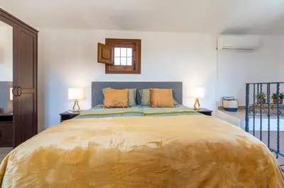 Cama o camas de una habitación en Hacienda la buena vida B&B en appartementen